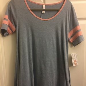 Blue background with varsity stripes - NWT Lularoe